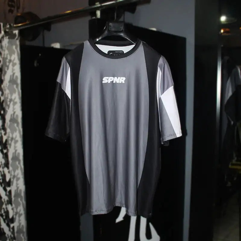 CAMISETA SPNR OVERSIZE BLOQUES GRISES