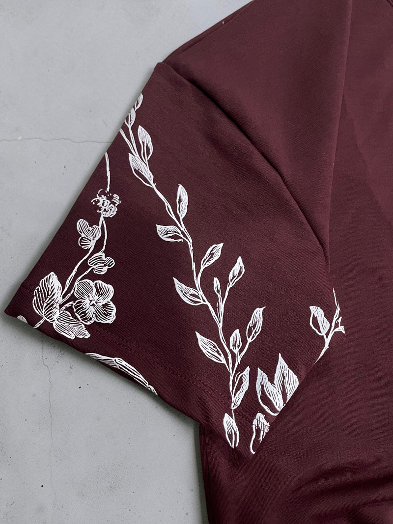 CAMISETA OVERSIZE SPNR FLORES ESPALDA