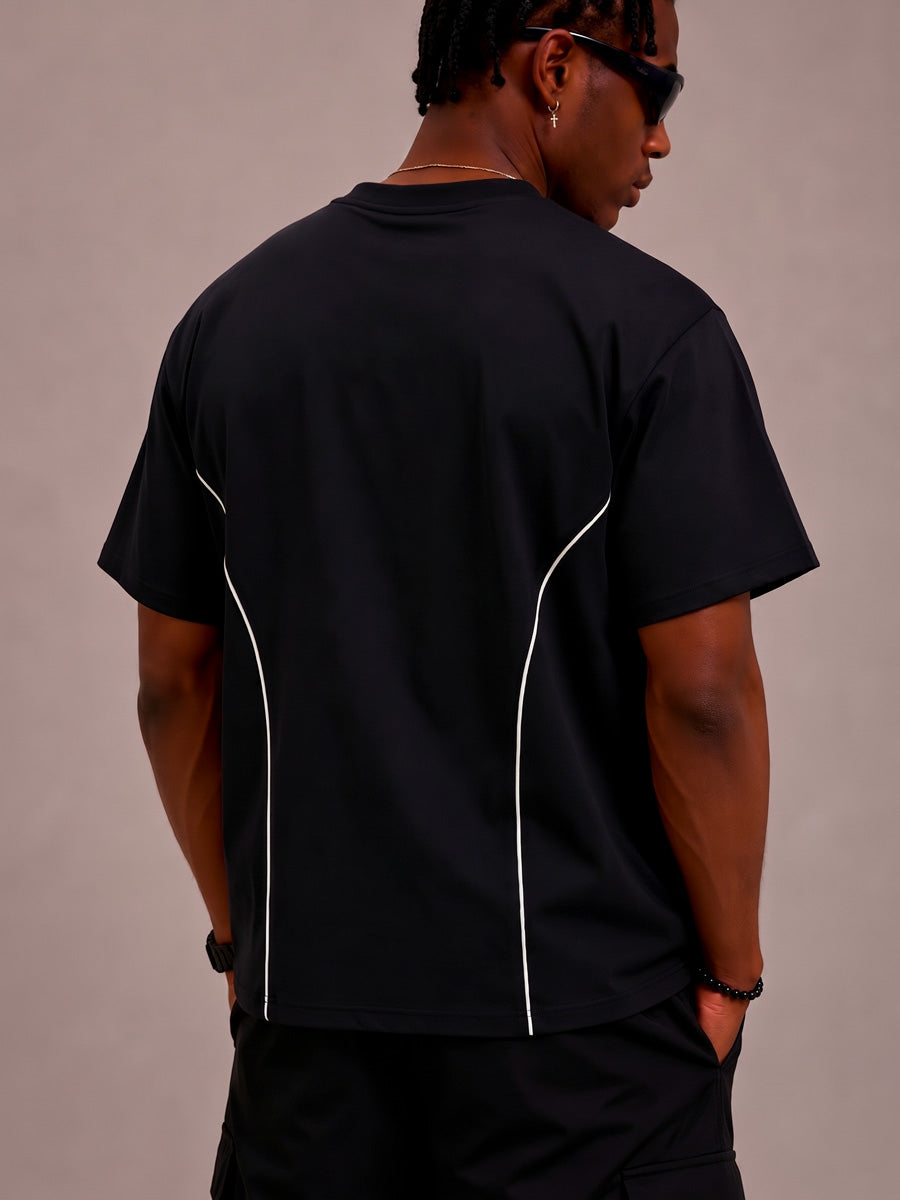 CAMISETA OVERSIZE SPNR CORTES NEGRO BASICA